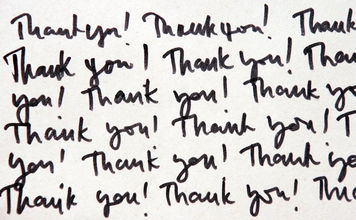thank you message thank you message handwritten on white paper