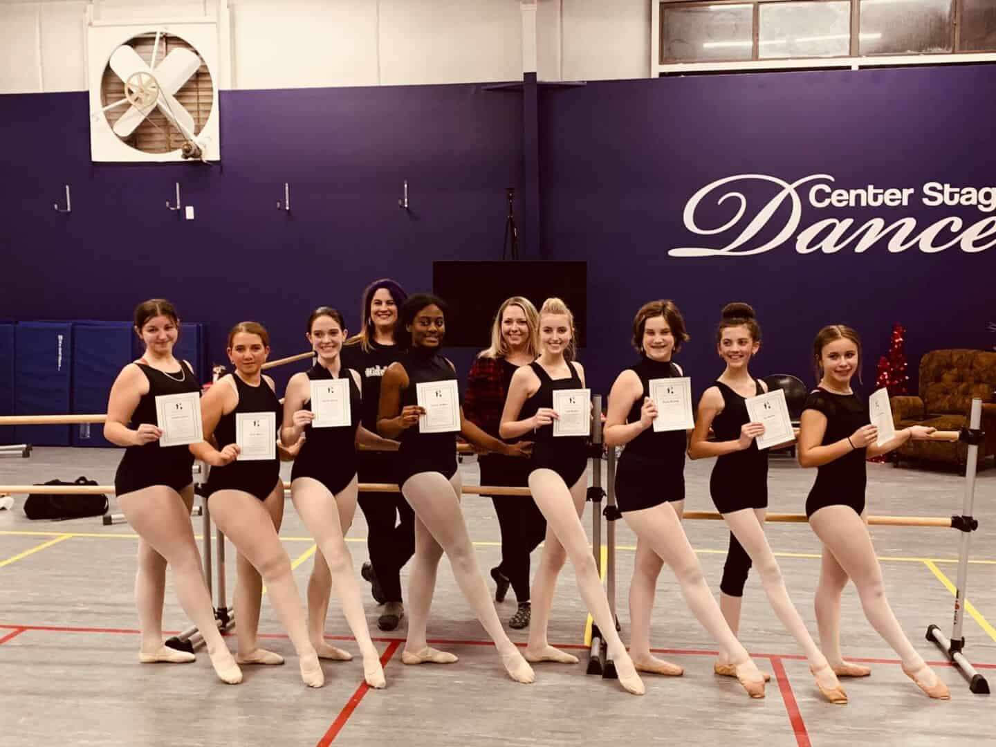 Amanda Herring smiling with students